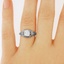 The Plumosa Ring, smalltop view on a hand