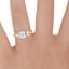 18K Yellow Gold Embrace Three Stone Diamond Ring, smallzoomed in top view on a hand
