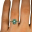 The Netra Ring, smallzoomed in top view on a hand