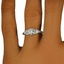The Oneida Ring, smallzoomed in top view on a hand