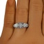 The Tacita Ring, smallzoomed in top view on a hand
