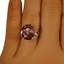 The Glora Ring, smallzoomed in top view on a hand