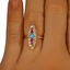The Alisia Ring, smallzoomed in top view on a hand