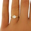 The Dora Ring, smalltop view on a hand