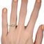 The October Ring, smallzoomed in top view on a hand