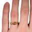 The Buckle Ring, smallzoomed in top view on a hand