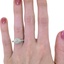 The Flossie Ring, smallzoomed in top view on a hand