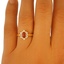 The Thea Ring, smalltop view on a hand