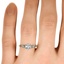 The Hadria Ring, smallzoomed in top view on a hand