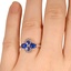 The Cheche Ring, smallzoomed in top view on a hand