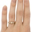 The Rosy Ring, smallzoomed in top view on a hand