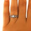 The Anne-Marie Ring, smallzoomed in top view on a hand