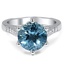 Custom Embellished Aquamarine Ring with Decorative Crown