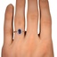 The Eztli Ring, smallzoomed in top view on a hand