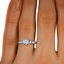 The Desmera Ring, smallzoomed in top view on a hand