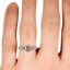 The Varsha Ring, smallzoomed in top view on a hand