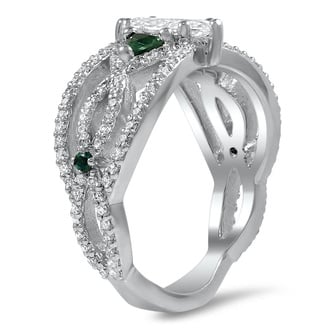 Custom Open Strand Engagement Ring with Trillion-Shaped Emeralds