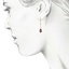 The Aiko Earrings, smallzoomed in top view on a hand