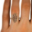 The Anca Ring, smallzoomed in top view on a hand