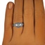 The Madie Ring, smalltop view on a hand