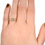 The Theanna Ring, smallzoomed in top view on a hand