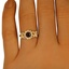 The Domineca Ring, smalltop view on a hand