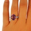 The Clemency Ring, smalltop view on a hand