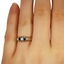 The Idania Ring, smallzoomed in top view on a hand