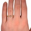 The Gema Ring, smallzoomed in top view on a hand