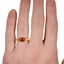 The Natale Ring, smallzoomed in top view on a hand