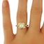 The Quintara Ring, smalltop view on a hand