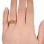 The Calais Ring, smallzoomed in top view on a hand