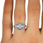 The Alaine Ring, smallzoomed in top view on a hand