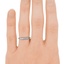 The Aretha Ring, smallzoomed in top view on a hand