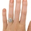 The Iolana Ring, smallzoomed in top view on a hand