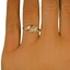 The Charita Ring, smalltop view on a hand