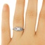 The Aurora Ring, smalltop view on a hand