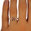The Teofila Ring, smallzoomed in top view on a hand