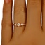 The Honoria Ring, smallzoomed in top view on a hand
