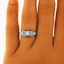 The Eleni Ring, smallzoomed in top view on a hand