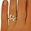 The Yokona Ring, smallzoomed in top view on a hand