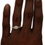 The Coralee Ring, smallzoomed in top view on a hand