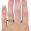 The Cammy Ring, smallzoomed in top view on a hand