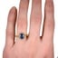 The Sapphire Ring, smallzoomed in top view on a hand