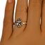 The Fortuo Ring, smallzoomed in top view on a hand