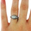 The Lucie Ring, smalltop view on a hand