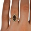The Aolani Ring, smallzoomed in top view on a hand