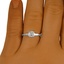 The Karna Ring, smallzoomed in top view on a hand