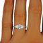 The Larkspur Ring, smallzoomed in top view on a hand