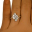 The Emilia Ring, smallzoomed in top view on a hand